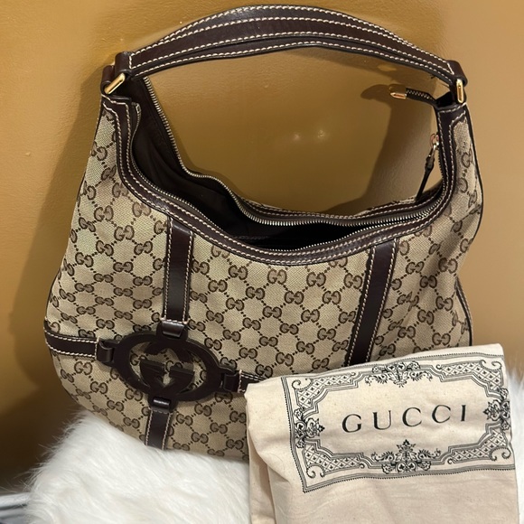 Gucci Handbags - Vintage Authentic Gucci purse! Good condition, duffle bag included.